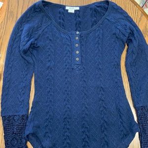 Navy blue long sleeve sweater. Size medium to large.
